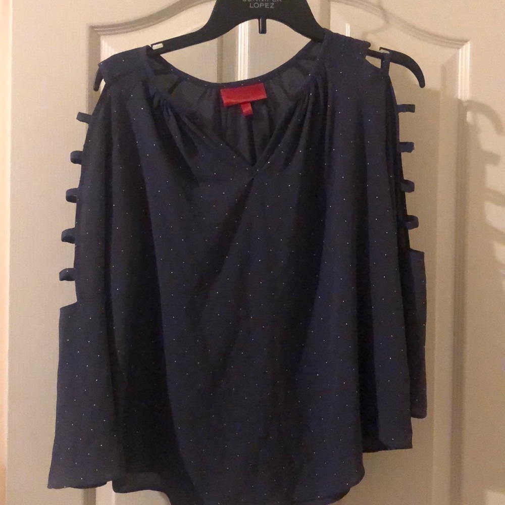 Jennifer Lopez purple glitter shirt bell sleeves